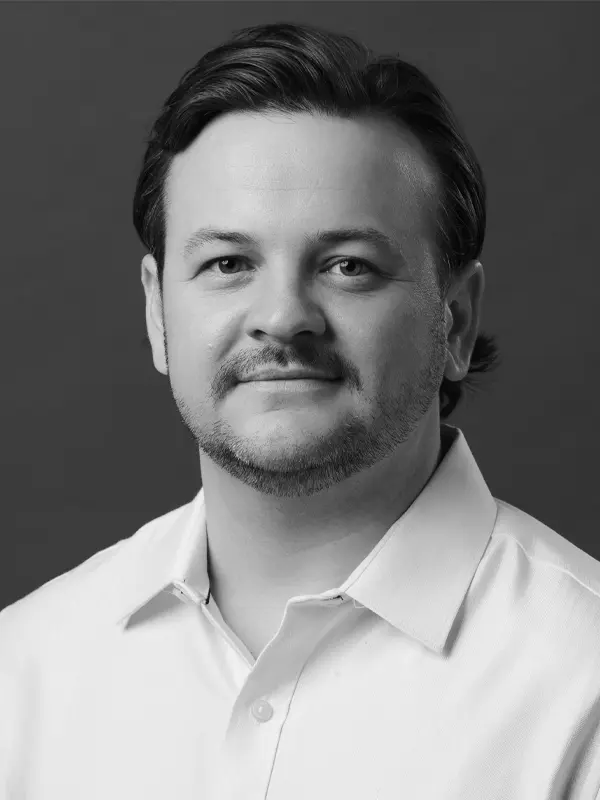 Professional headshot of Drew Woods